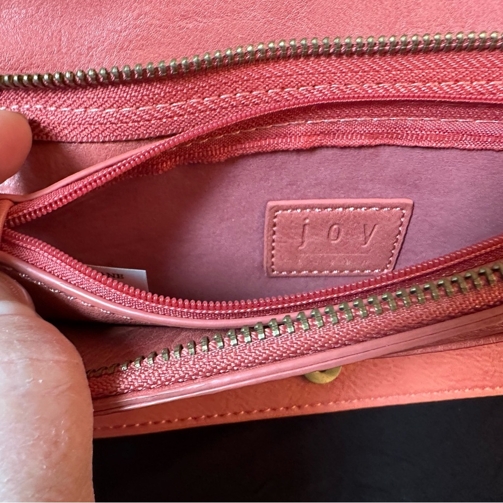 Joy wristlet clutch.  Light red